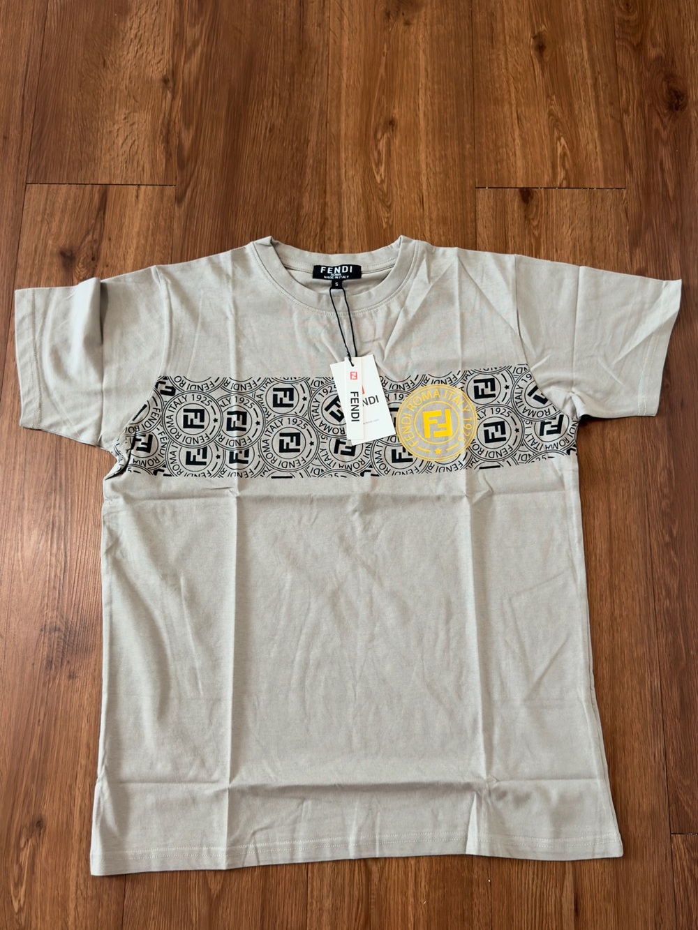 Fendi Beige Crewneck T-Shirt with Black Logo Band and Yellow Emblem